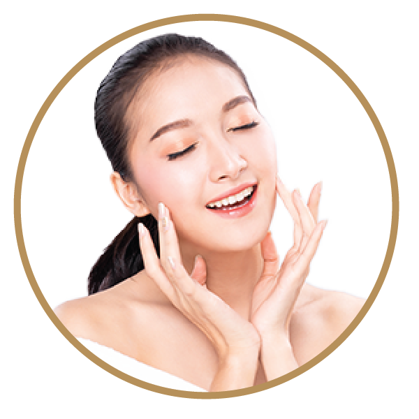 Woman smiling with glowing skin and closed eyes